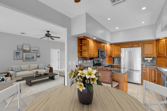 kitchen featuring stainless steel appliances, open shelves, visible vents, a ceiling fan, and light tile patterned flooring