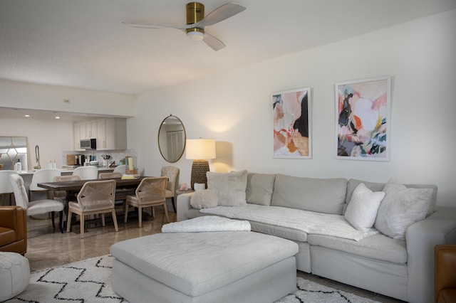 living room with ceiling fan