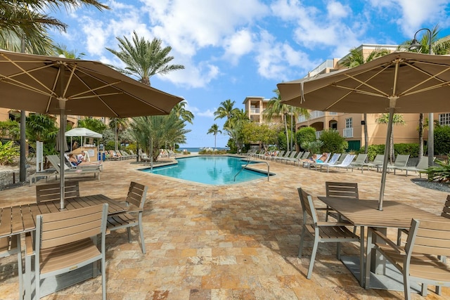 pool with a patio