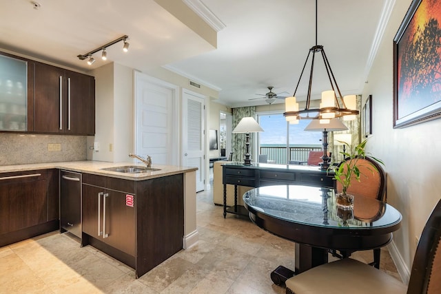 kitchen featuring crown molding, light countertops, decorative backsplash, a sink, and dark brown cabinets