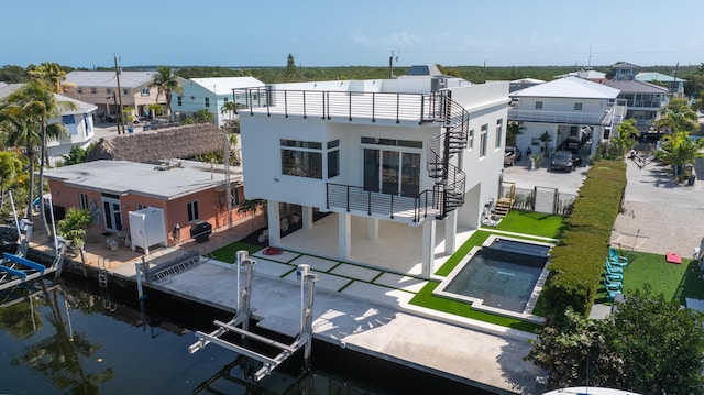 back of house with a patio area