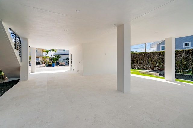view of patio with a jacuzzi