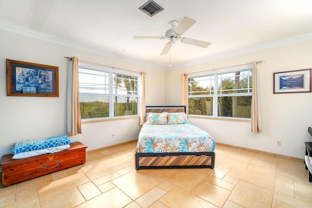 bedroom with ornamental molding, multiple windows, and visible vents