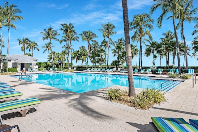 view of swimming pool with a patio area