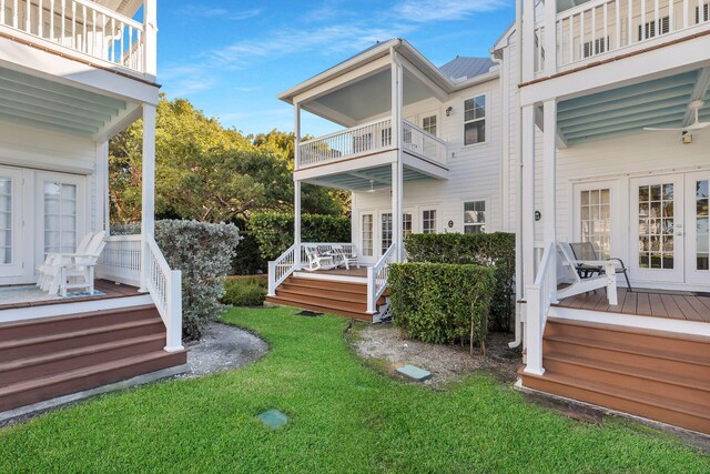 view of yard with a wooden deck