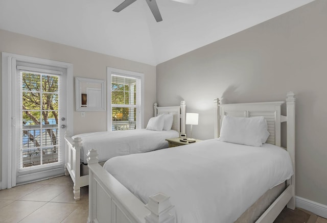 bedroom featuring light tile patterned flooring, ceiling fan, lofted ceiling, and access to outside