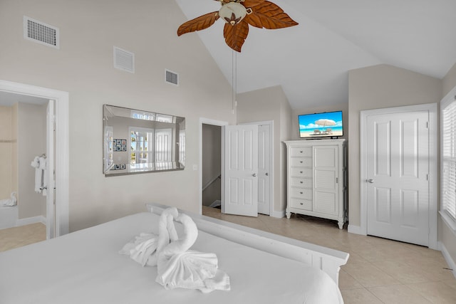 bedroom featuring light tile patterned floors, high vaulted ceiling, and ceiling fan