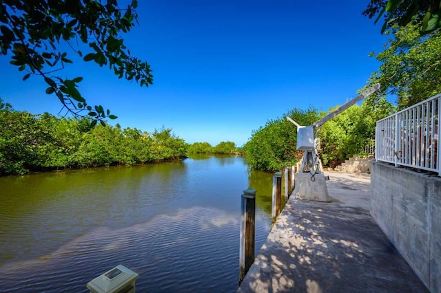 view of dock with a water view