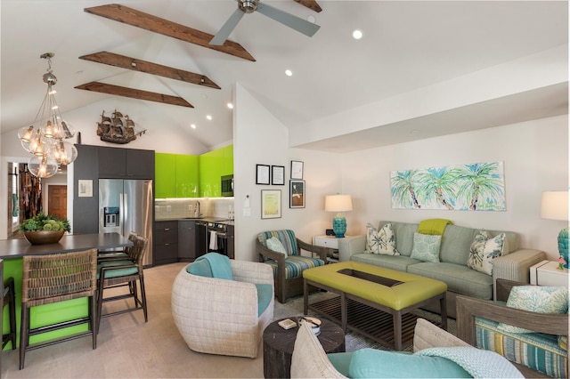 living room featuring high vaulted ceiling, ceiling fan with notable chandelier, and beam ceiling