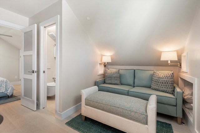 living room with lofted ceiling