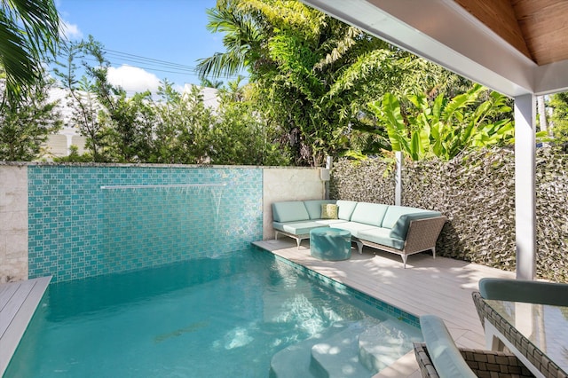 view of swimming pool with outdoor lounge area