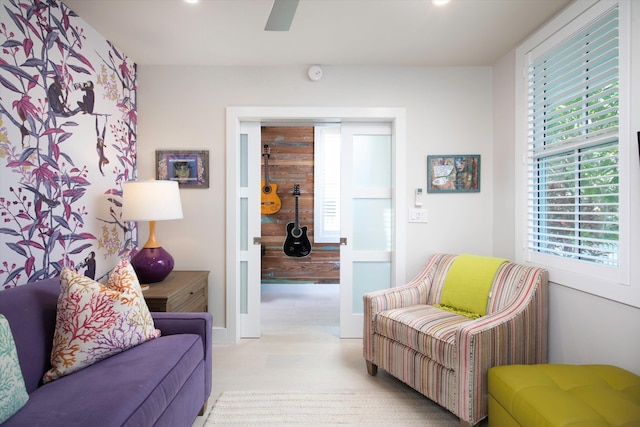 living room featuring ceiling fan