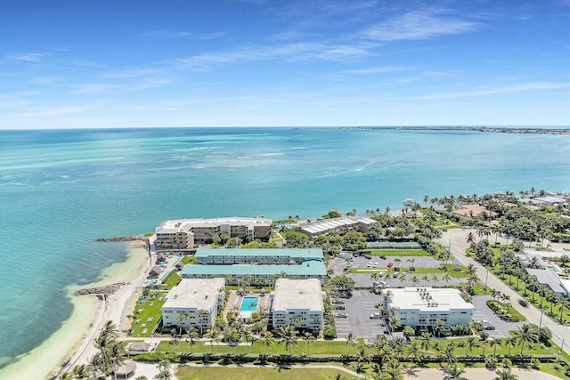 bird's eye view featuring a beach view and a water view