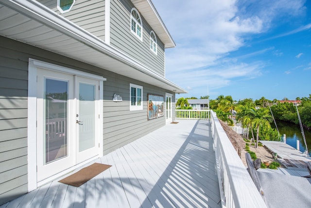 deck featuring a water view