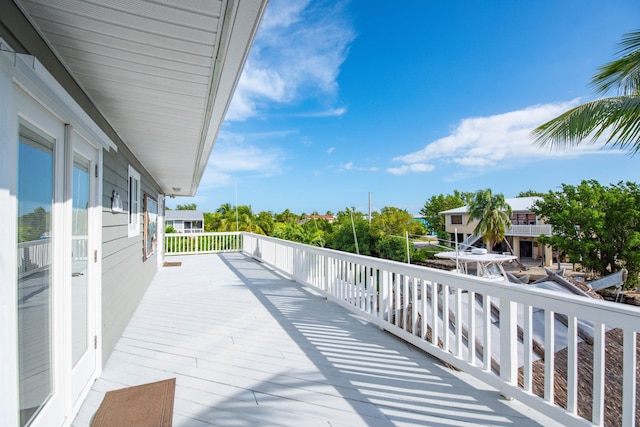 wooden balcony featuring a deck