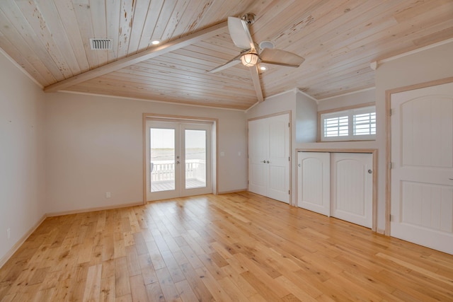 additional living space with ceiling fan, light hardwood / wood-style floors, vaulted ceiling, wooden ceiling, and french doors