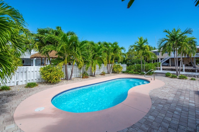 view of swimming pool featuring a patio