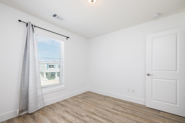 empty room featuring light hardwood / wood-style floors