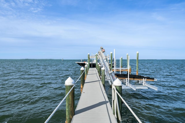 dock area with a water view