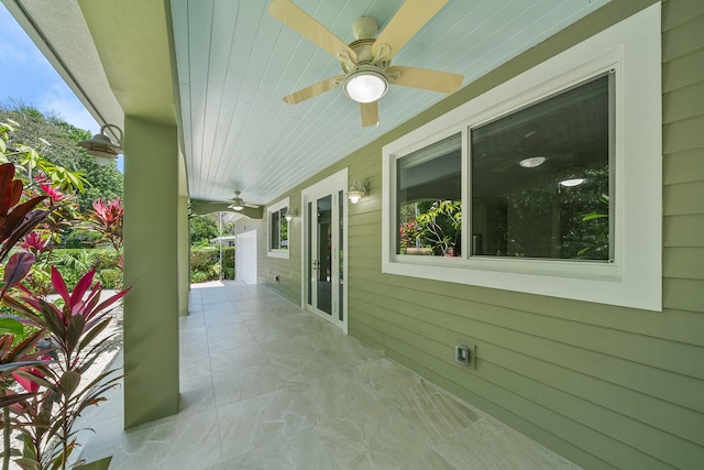 view of patio with a porch and ceiling fan