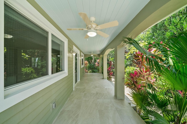 view of patio featuring ceiling fan