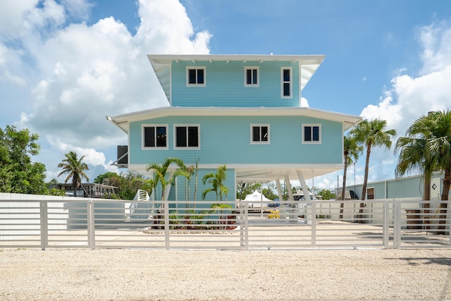 415 Big Pine Rd, Key Largo, FL 33037 - view of front of property featuring a carport and a fenced front yard