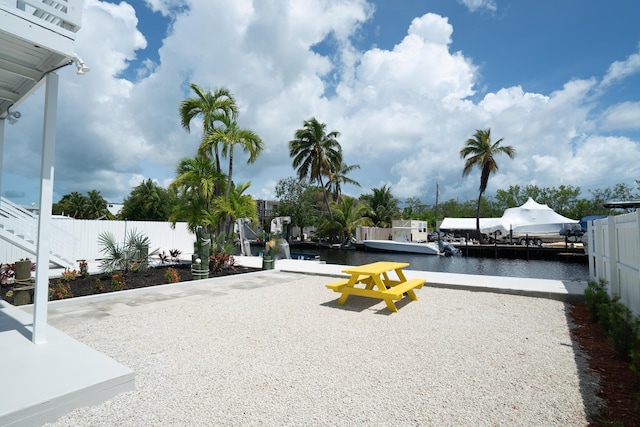 415 Big Pine Rd, Key Largo, FL 33037 - view of yard with a water view and a boat dock