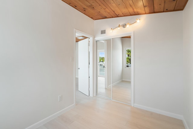 415 Big Pine Rd, Key Largo, FL 33037 - empty room with wooden ceiling and light wood-style floors