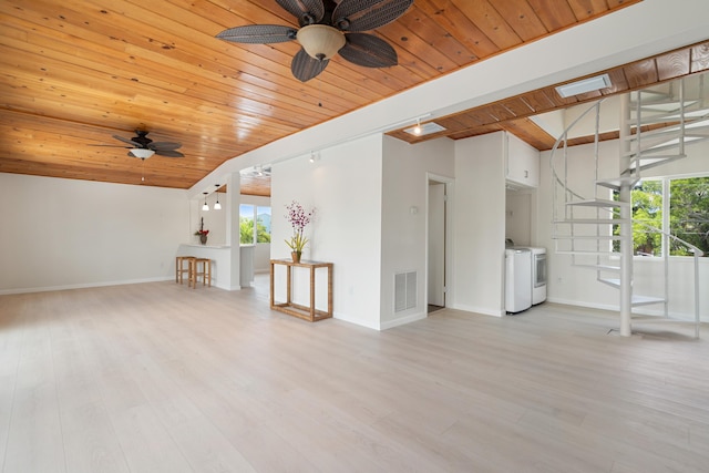 415 Big Pine Rd, Key Largo, FL 33037 - unfurnished living room featuring ceiling fan, washer and dryer, wood ceiling, and light wood-type flooring