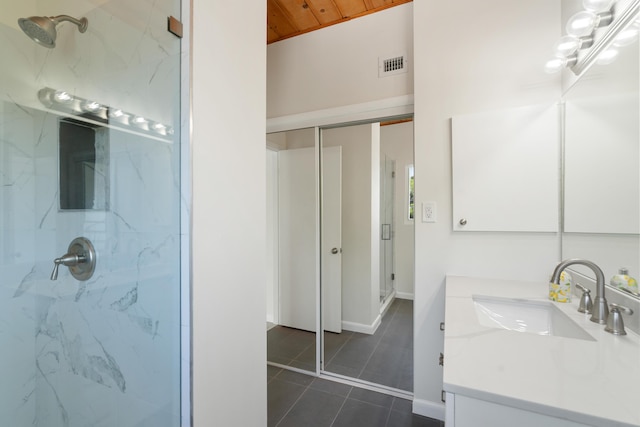 415 Big Pine Rd, Key Largo, FL 33037 - full bathroom featuring a marble finish shower, vanity, tile patterned flooring, and wood ceiling