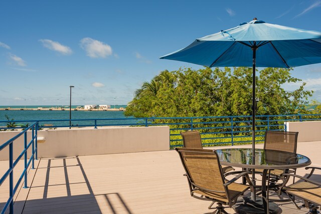 deck featuring a water view