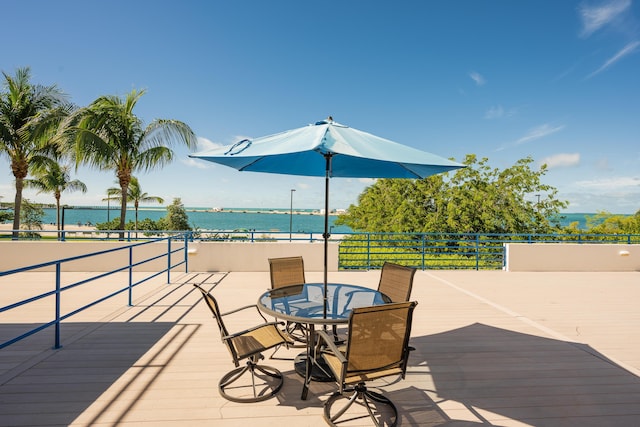 deck featuring a water view