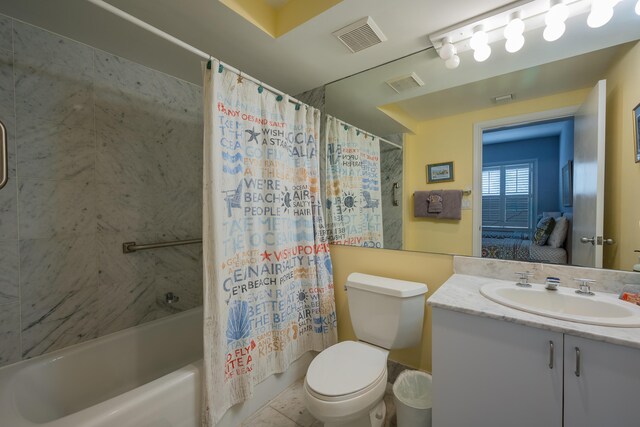 full bathroom featuring vanity, toilet, and shower / tub combo