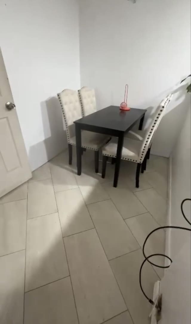 3312 Northside Dr Unit 607, Key West, FL 33040 - dining area featuring tile patterned floors