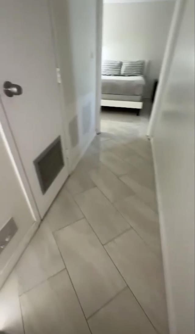 3312 Northside Dr Unit 607, Key West, FL 33040 - hallway featuring light tile patterned floors
