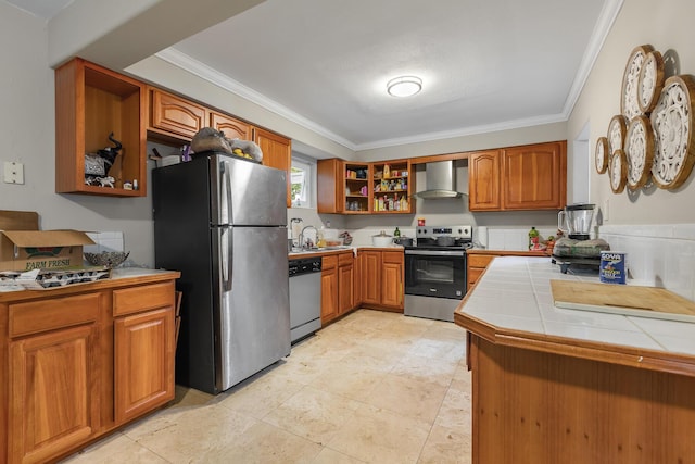 kitchen featuring brown cabinets, tile countertops, open shelves, stainless steel appliances, and wall chimney range hood