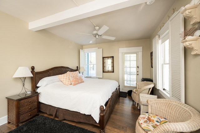 bedroom featuring baseboards, dark wood-style flooring, beam ceiling, and a ceiling fan