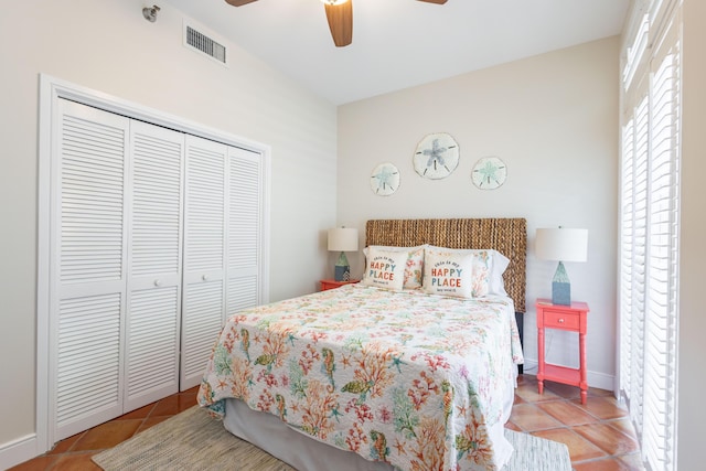 115 Front St Unit 102, Key West, FL 33040 - tiled bedroom with a closet and ceiling fan