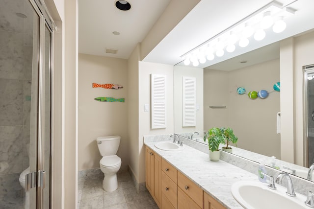 115 Front St Unit 102, Key West, FL 33040 - bathroom featuring double vanity, a stall shower, and tile patterned flooring