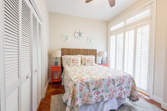 115 Front St Unit 102, Key West, FL 33040 - tiled bedroom featuring a closet and a ceiling fan