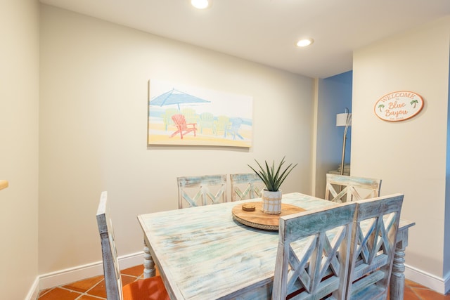 115 Front St Unit 102, Key West, FL 33040 - tiled dining area with baseboards and recessed lighting