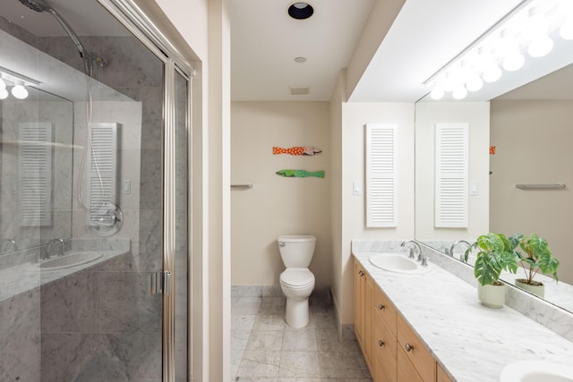 115 Front St Unit 102, Key West, FL 33040 - bathroom featuring double vanity and a stall shower