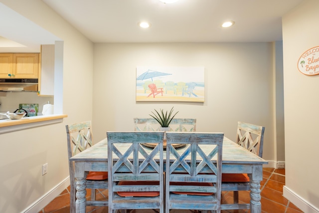 115 Front St Unit 102, Key West, FL 33040 - dining area featuring dark tile patterned floors and recessed lighting