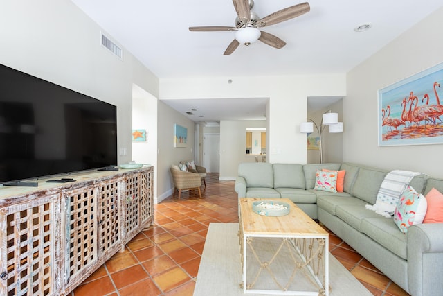 115 Front St Unit 102, Key West, FL 33040 - living room with tile patterned flooring and ceiling fan