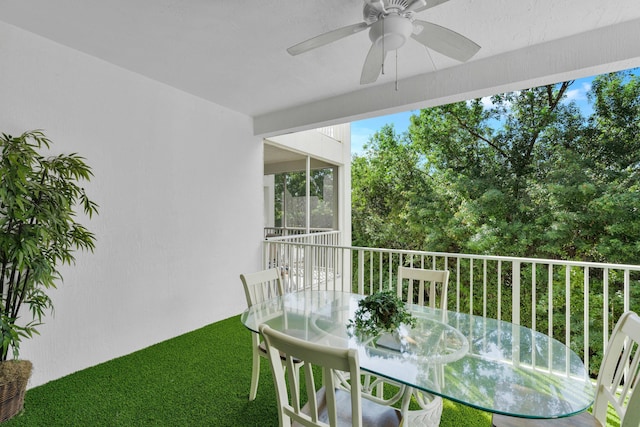 exterior space featuring ceiling fan