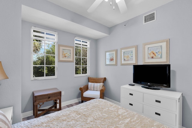 bedroom featuring hardwood / wood-style flooring and ceiling fan