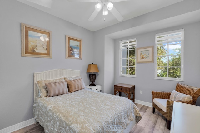 bedroom featuring ceiling fan and light wood-type flooring