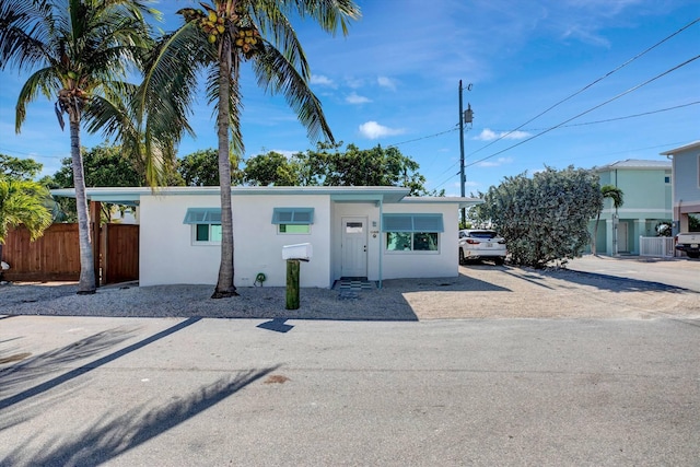 view of front of property with cooling unit