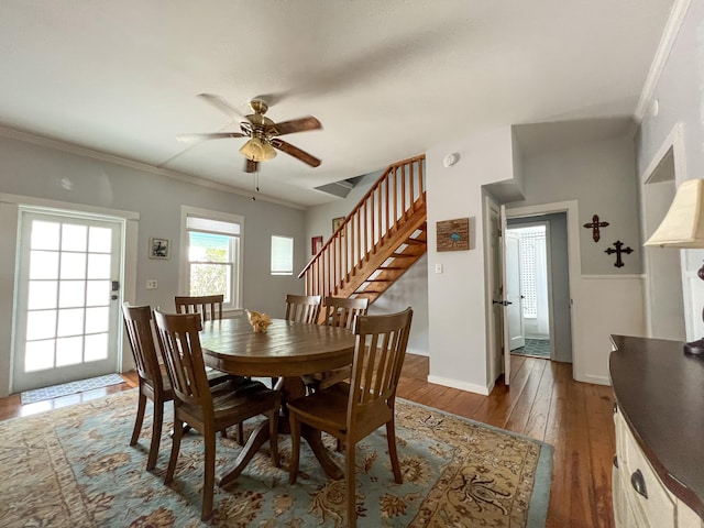 846 Olivia St, Key West, FL 33040 - dining space featuring stairs, crown molding, a ceiling fan, hardwood / wood-style floors, and baseboards