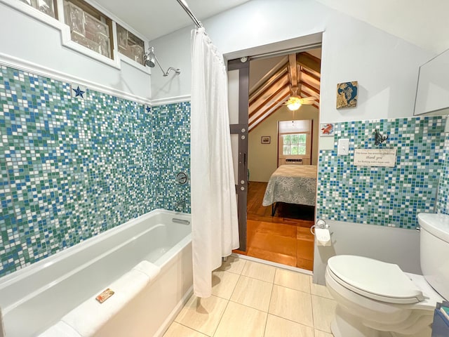 846 Olivia St, Key West, FL 33040 - ensuite bathroom with tile walls, shower / bathtub combination with curtain, toilet, tile patterned floors, and a wainscoted wall